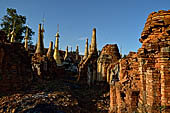 Inle Lake Myanmar. Indein, on the summit of a hill the  Shwe Inn Thein Paya a cluster of hundreds of ancient stupas. Many of them are ruined and overgrown with bushes. 